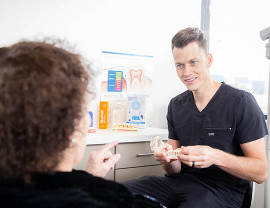 Dr. Christian Stanfield with patient at the Glendale Gentle Dentistry in Glendale, AZ